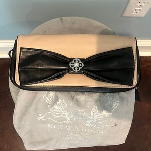 My Flat In London black and cream clutch NWOT. Bow detail. Excellent condition!